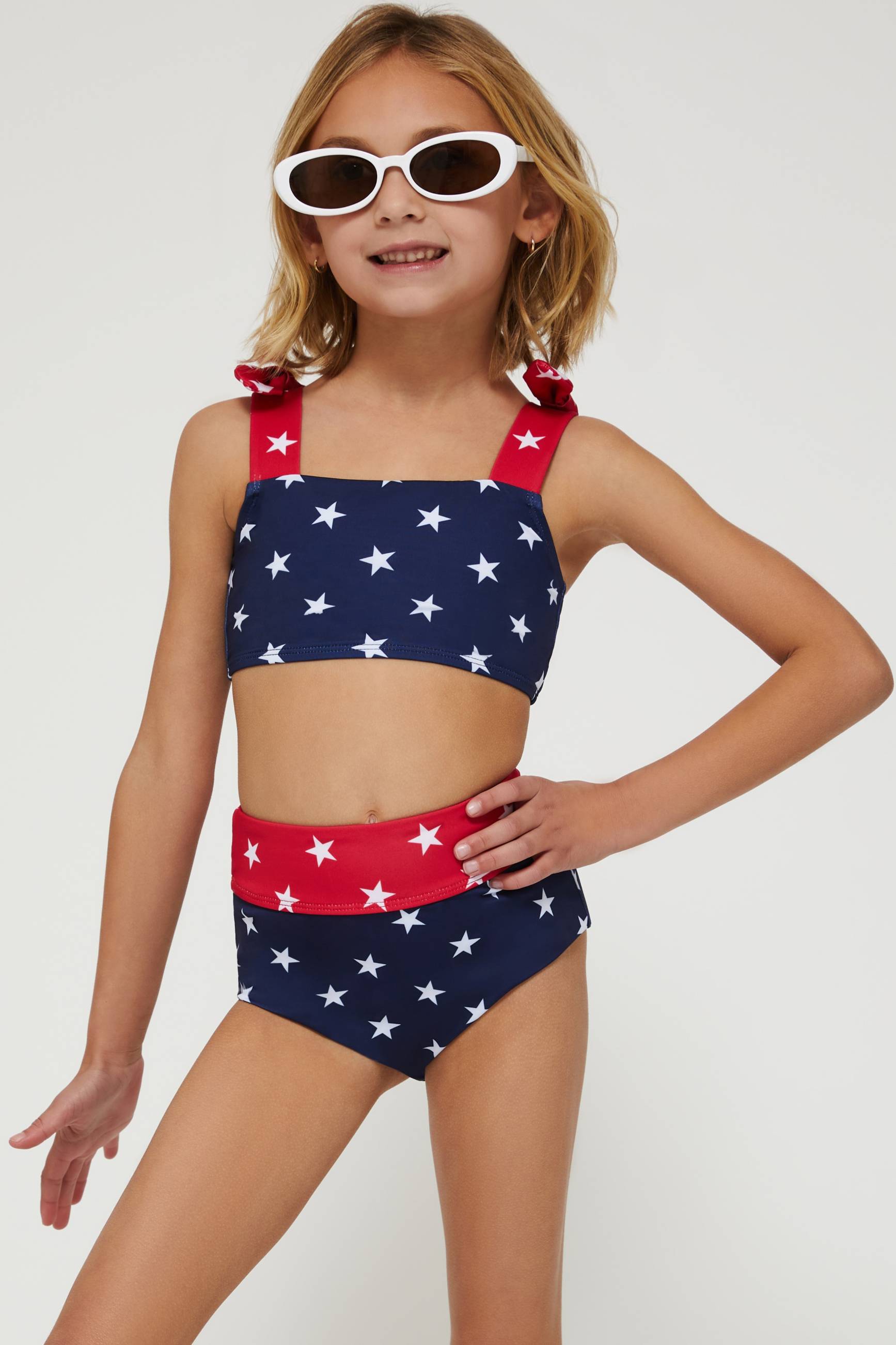 red and navy two piece swimsuit with stars for little girls