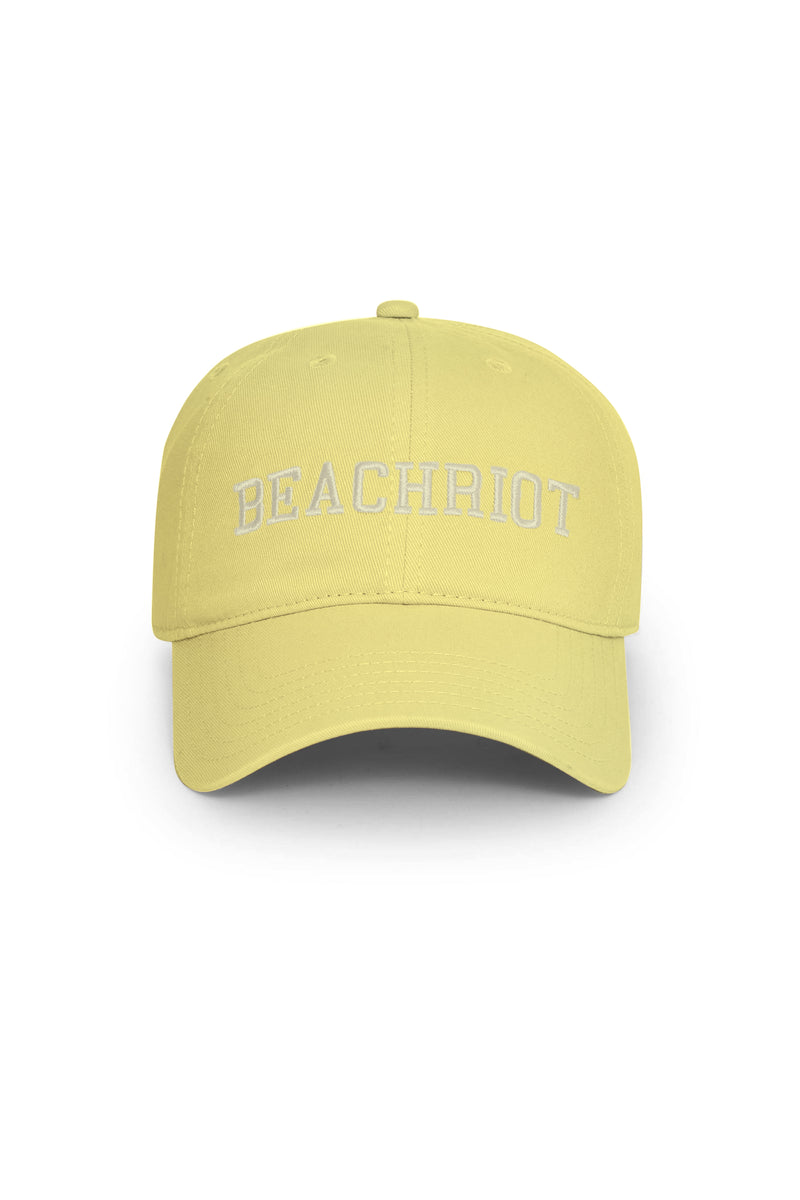 Yellow cap with 'BEACHRIDE' text on a white background