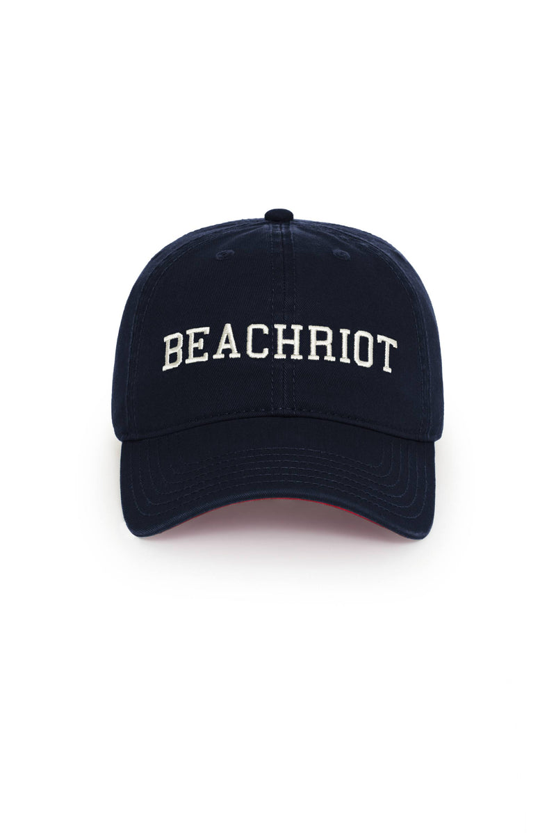 A navy blue baseball cap with the text 'BEACHRIOT' embroidered in white on the front.