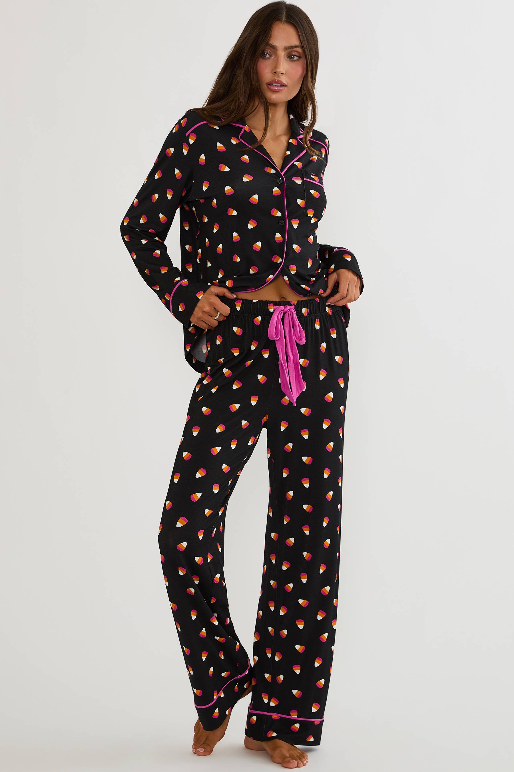 Long sleeve and pant pajama set with candy corns printed on. 