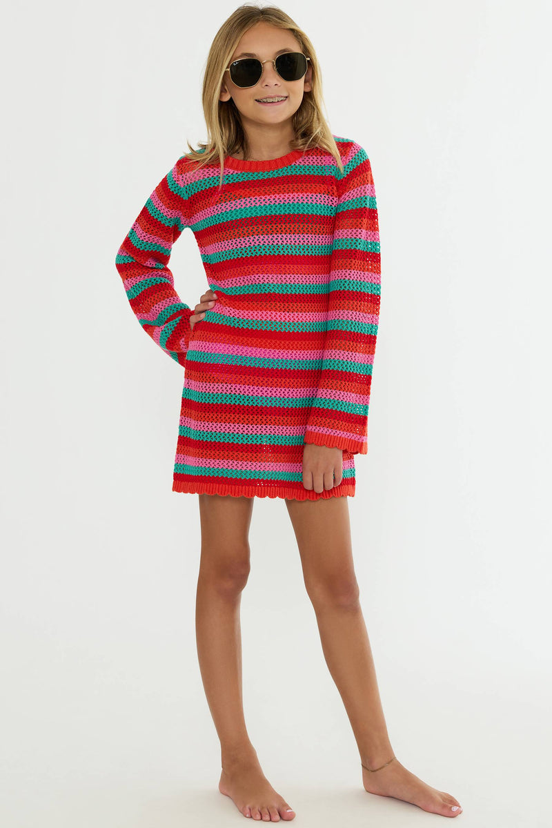 Little girl wearing a striped crochet long sleeve dress. 