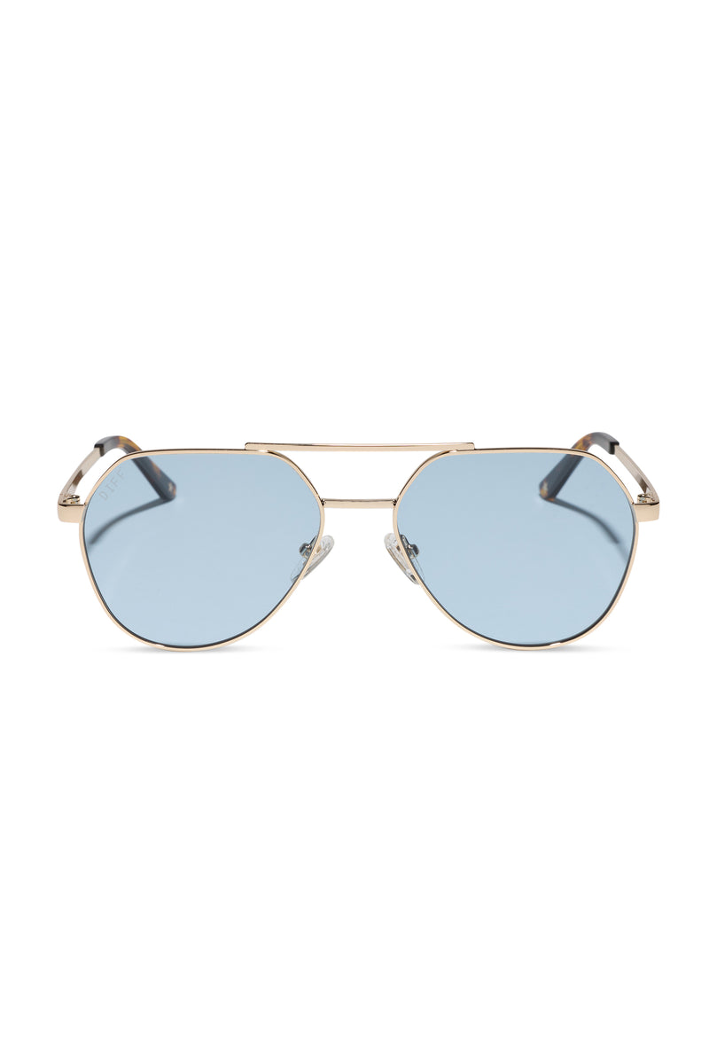 Sunglasses with gold frame and blue lenses on a white background