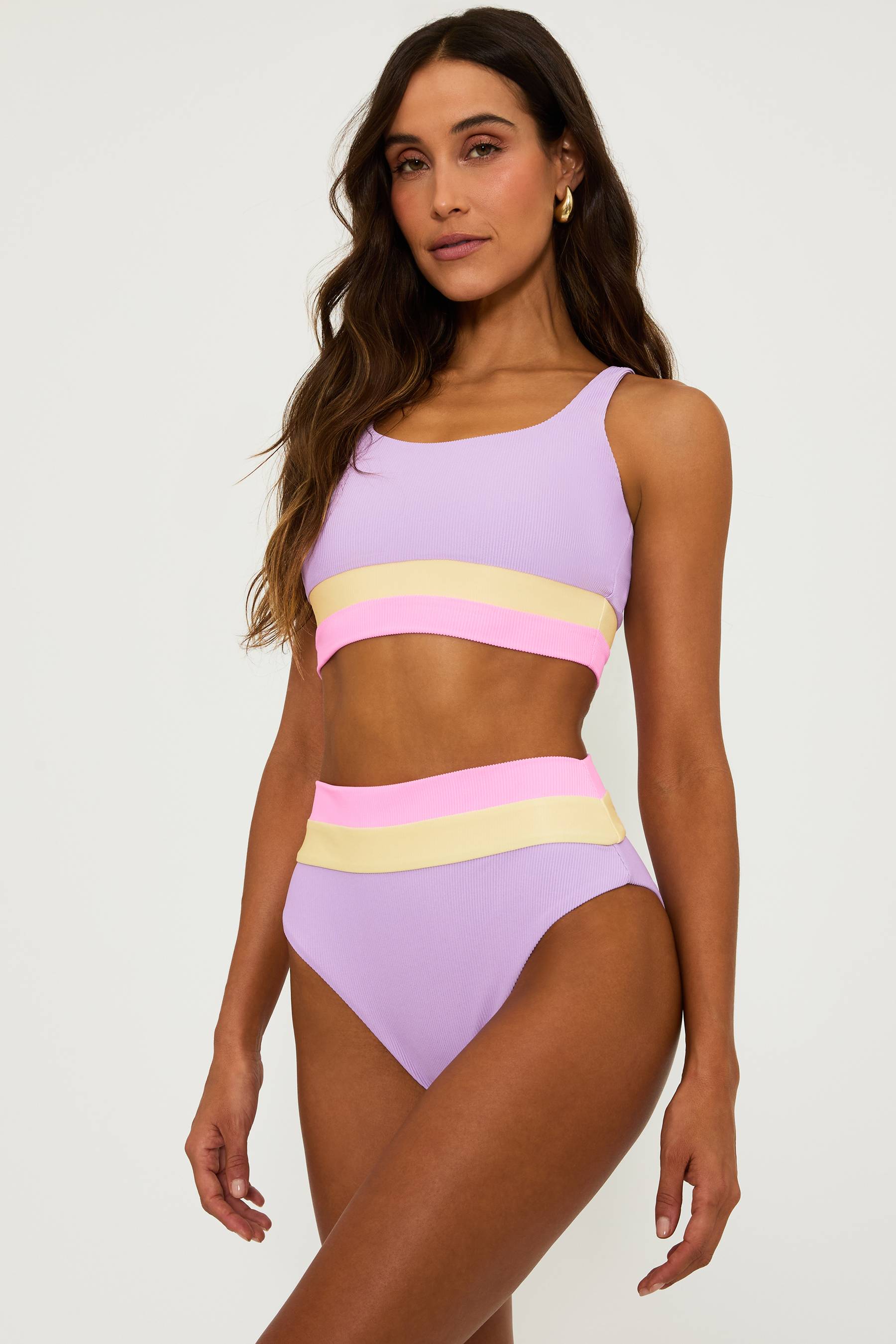 purple ribbed bikini set with pink and yellow stripped colorblock at the underband and waist