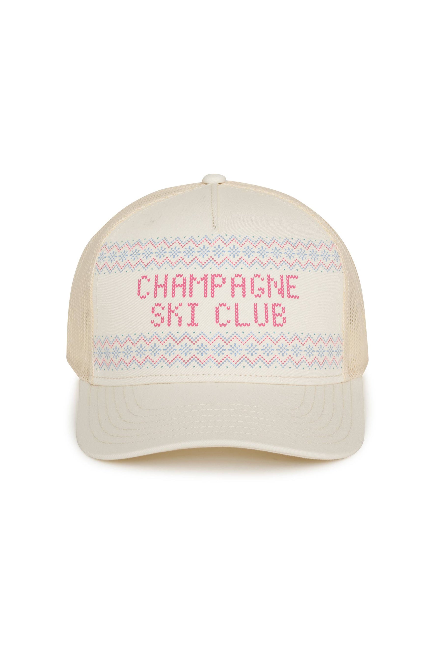 Beige cap with 'Champagne Ski Club' text and pattern on a white background