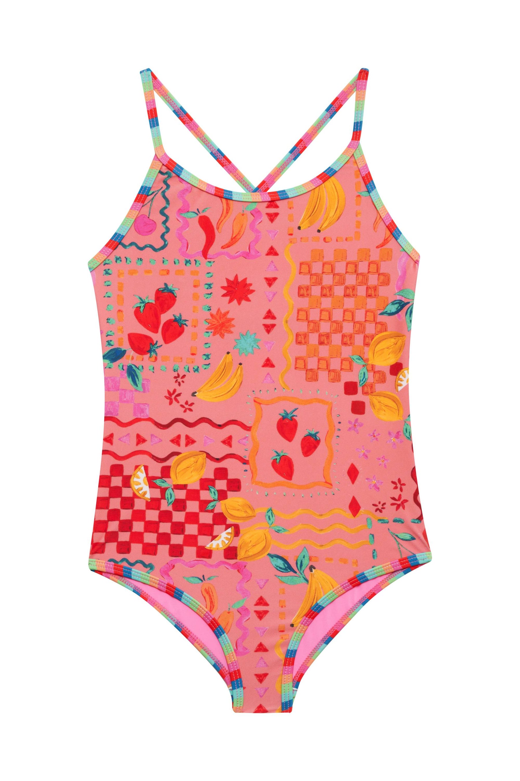 Colorful swimsuit with fruit pattern on a white background