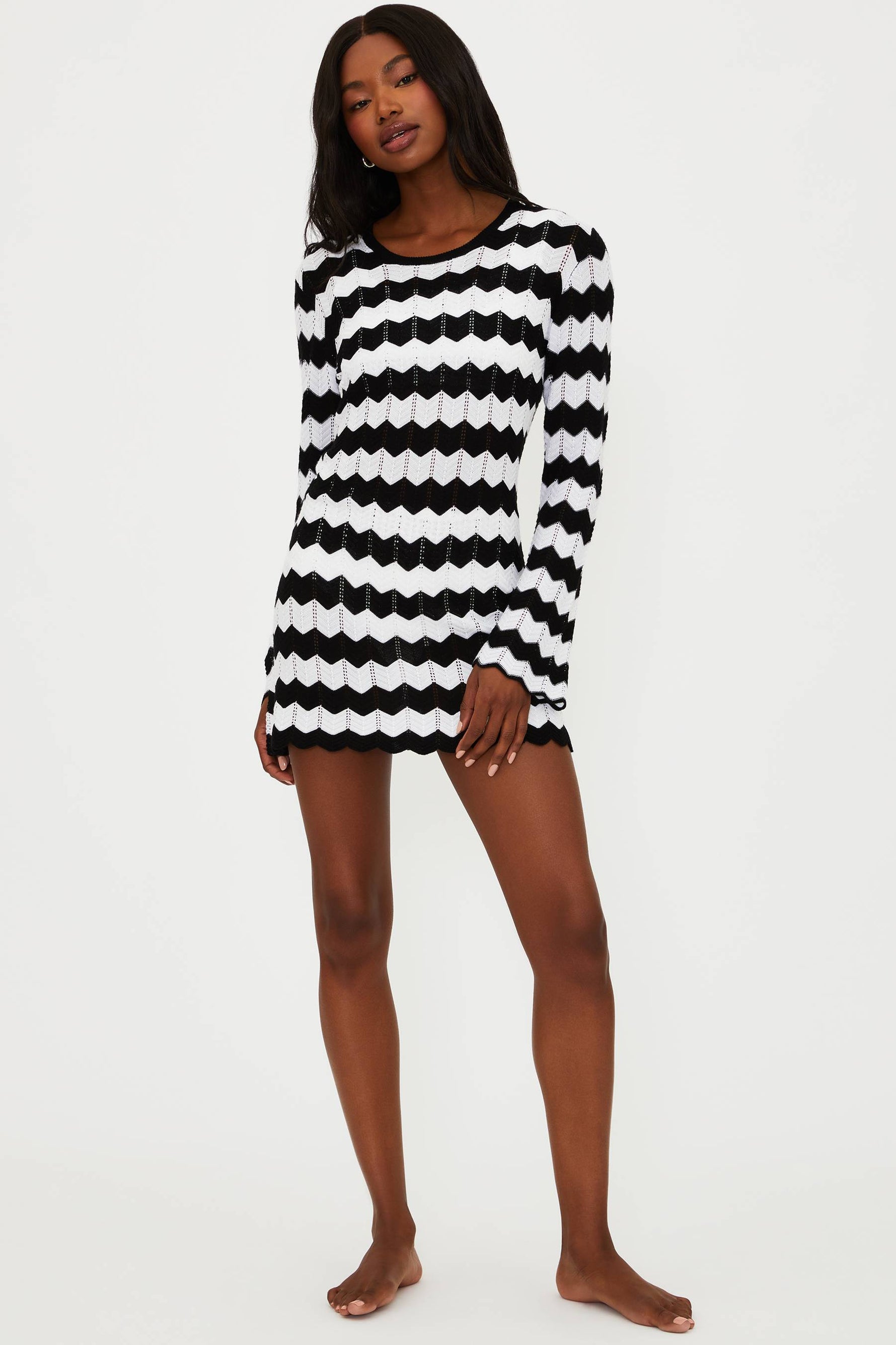 Open knit cover up mini dress with a black and white wavy print